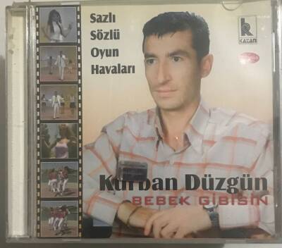 Kurban Düzgün *Bebek Gibisin * ( İkinci El ) CD Müzik CD2493 - 1